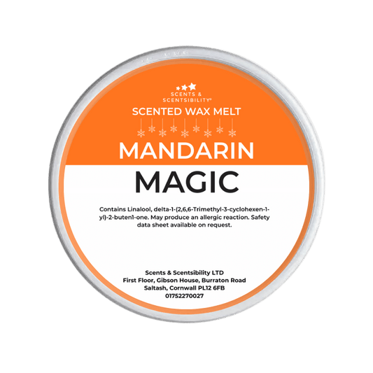Scented wax melt container labeled 'Mandarin Magic' on a green background