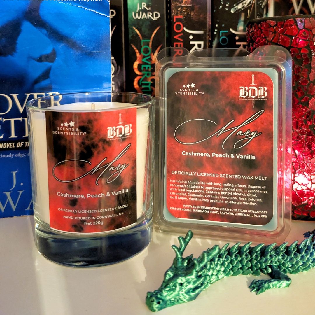 Scented candle and wax melts with packaging on a surface