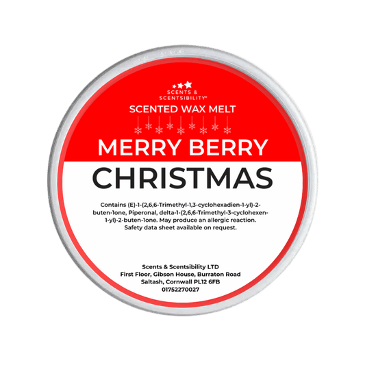 Scented wax melt container labeled 'Merry Berry Christmas' on a red background