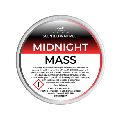 Scented wax melt container labeled 'Midnight Mass' on a green background
