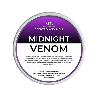 Scented wax melt container labeled 'Midnight Venom' with purple and white design.