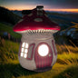 Mushroom-shaped wax melt warmer with a red cap and white body glowing in the dark outdoors.
