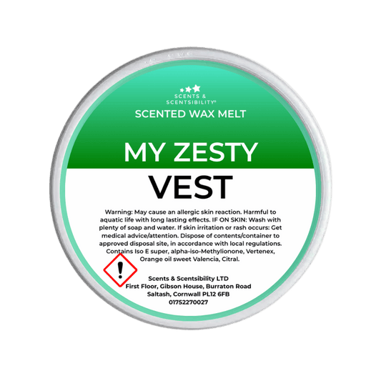 Scented wax melt container labeled 'My Zesty Vest' with green and white design.