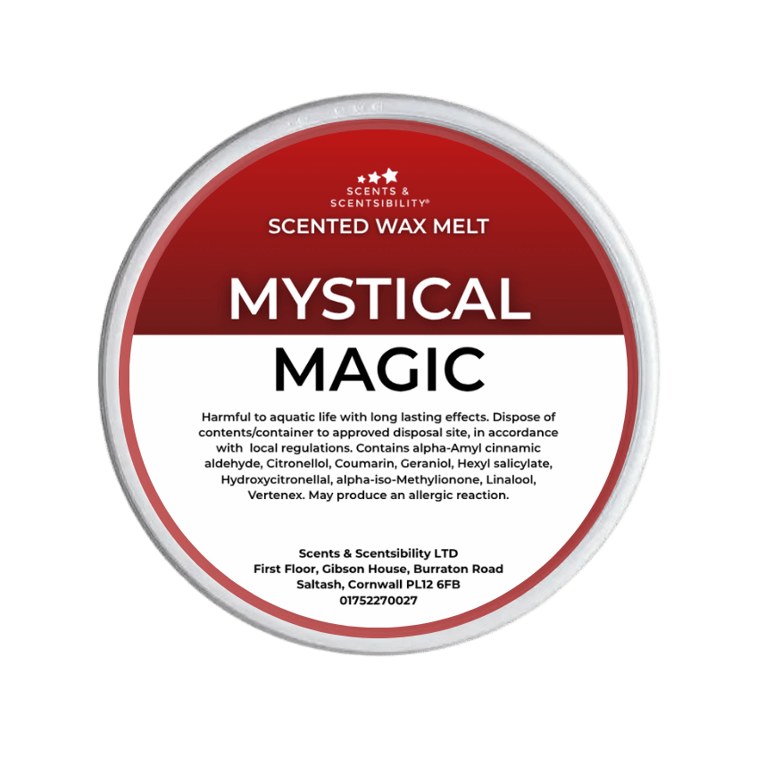 A Scents & Scentsibility 'Mystical Magic' scented wax melt, featuring a red and white label on a solid dark green background.