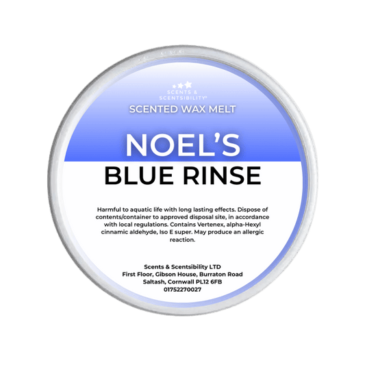 Scented wax melt container labeled 'Noel's Blue Rinse' with blue and white design.