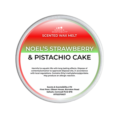 Scented wax melt container labeled 'Strawberry & Pistachio Cake' with green, red and white design.