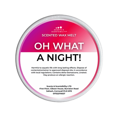 Scented wax melt container labeled 'Oh What A Night!' with pink, purple and white design.