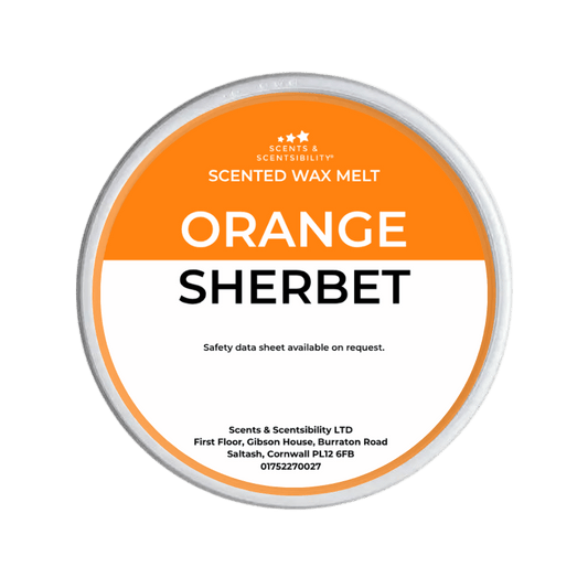 Scented wax melt container labeled 'Orange Sherbet' on a green background