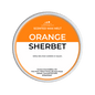 Scented wax melt container labeled 'Orange Sherbet' on a green background