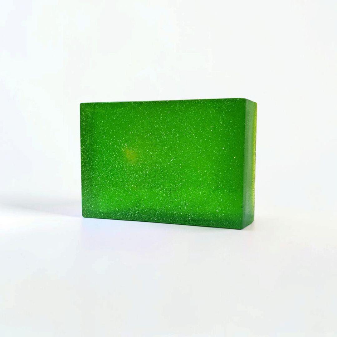 Green rectangular Pick Me Up Lime & Eucalyptus soap bar with a subtle shimmer on a white background.