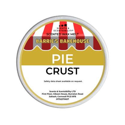 Scented wax melt container labeled 'Pie Crust' by Barrie's Bakehouse on a green background