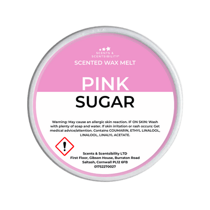 Scented wax melt container labeled 'Pink Sugar' with branding and contact information on a green background.
