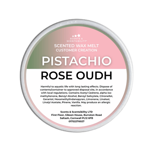 Scented wax melt container labelled 'Pistachio Rose Oudh' on a green background