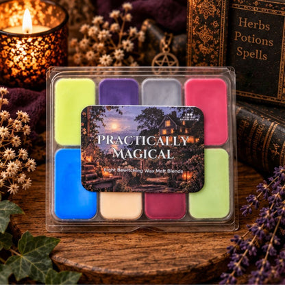 A clear plastic clamshell package containing eight wax melt pans in assorted colors, including lime green, purple, pink, blue, cream, and dark red. The package has a central label reading 'PRACTICALLY MAGICAL' with a cozy cottage scene.