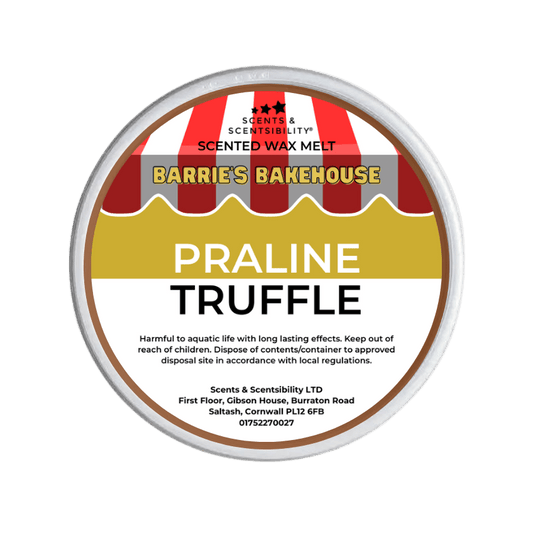 Scented wax melt container labeled 'Praline Truffle' from Barrie's Bakehouse on a green background