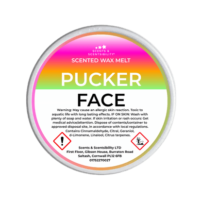 Scented wax melt container labeled 'Pucker Face' with a colorful label on a green background.