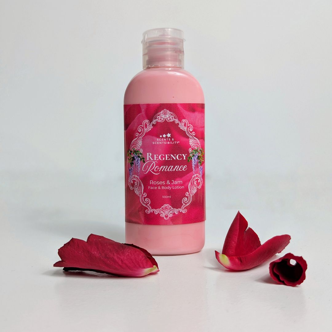 Pink bottle of 'Regency Romance' lotion with red flower petals on a light gray background
