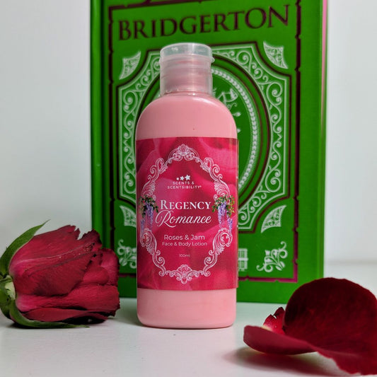 Pink bottle of 'Regency Romance' lotion with a green box labeled 'Bridgerton' and red roses on a white background.