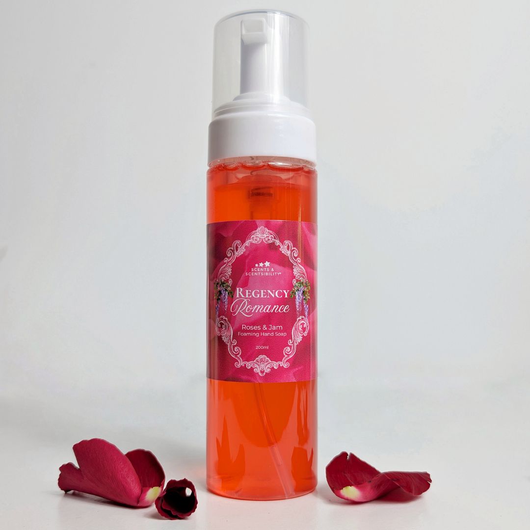 Bottle of 'Regency Romance' soap with rose petals on a light gray background