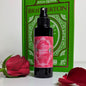 Bottle of 'Regency Romance' room spray with a red rose and book in the background