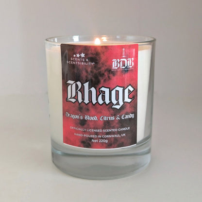 Candle with a red label featuring the brand 'BDB' and product name 'Rhage'.