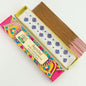 Incense sticks with a colorful box on a white background