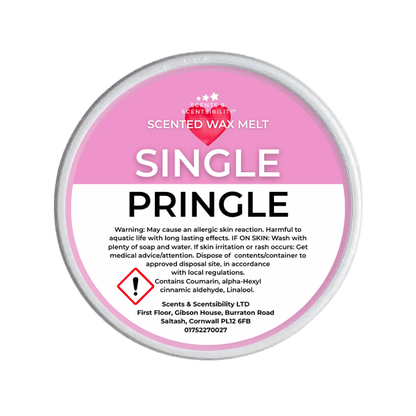 Scented wax melt container with pink label on a green background