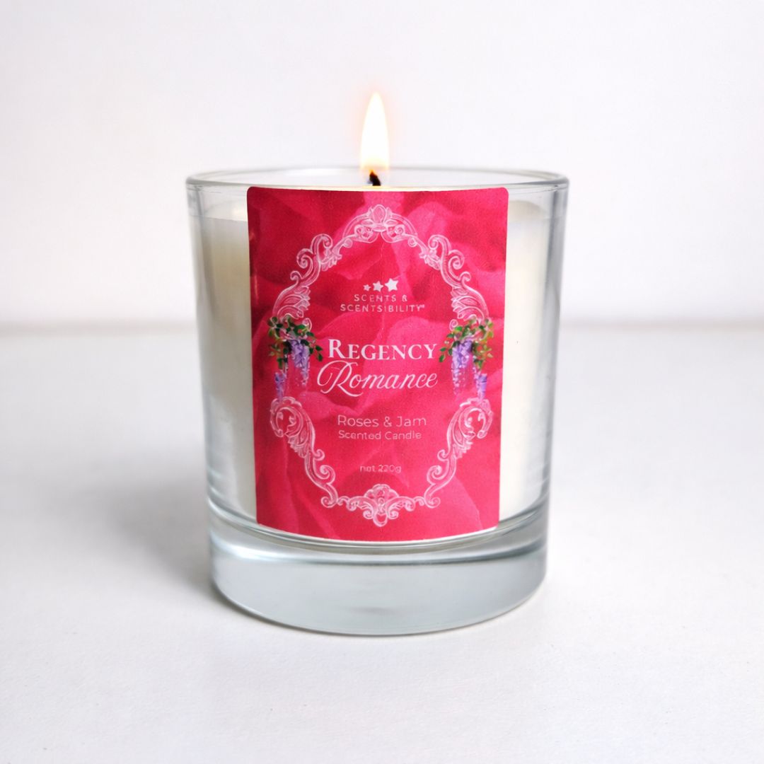 Candle with a pink label on a white background