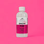 Bottle of 'Snow Fae' cleaner concentrate on a pink background