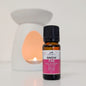 Bottle of 'Snow FAE' fragrance oil with a diffuser in the background