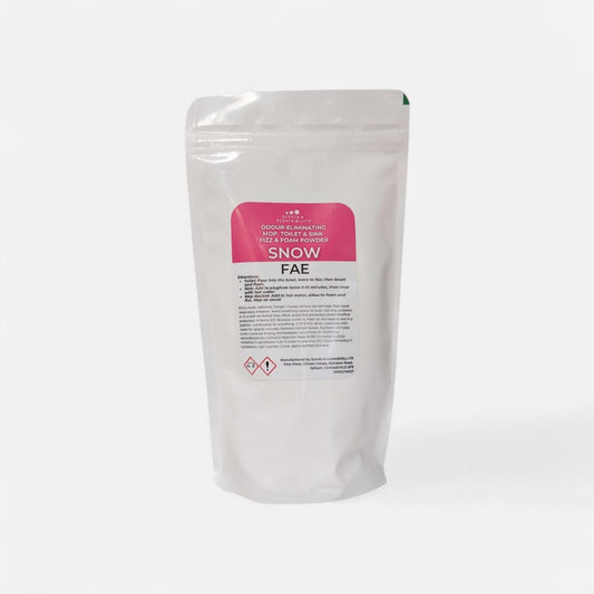 White packaging of 'Snow Fae' on a light gray background