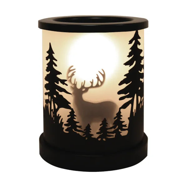 Decorative wax melt warmer with stag silhouette design on a wooden surface