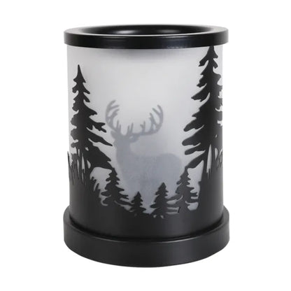 Decorative wax melt warmer with stag silhouette design on a wooden surface