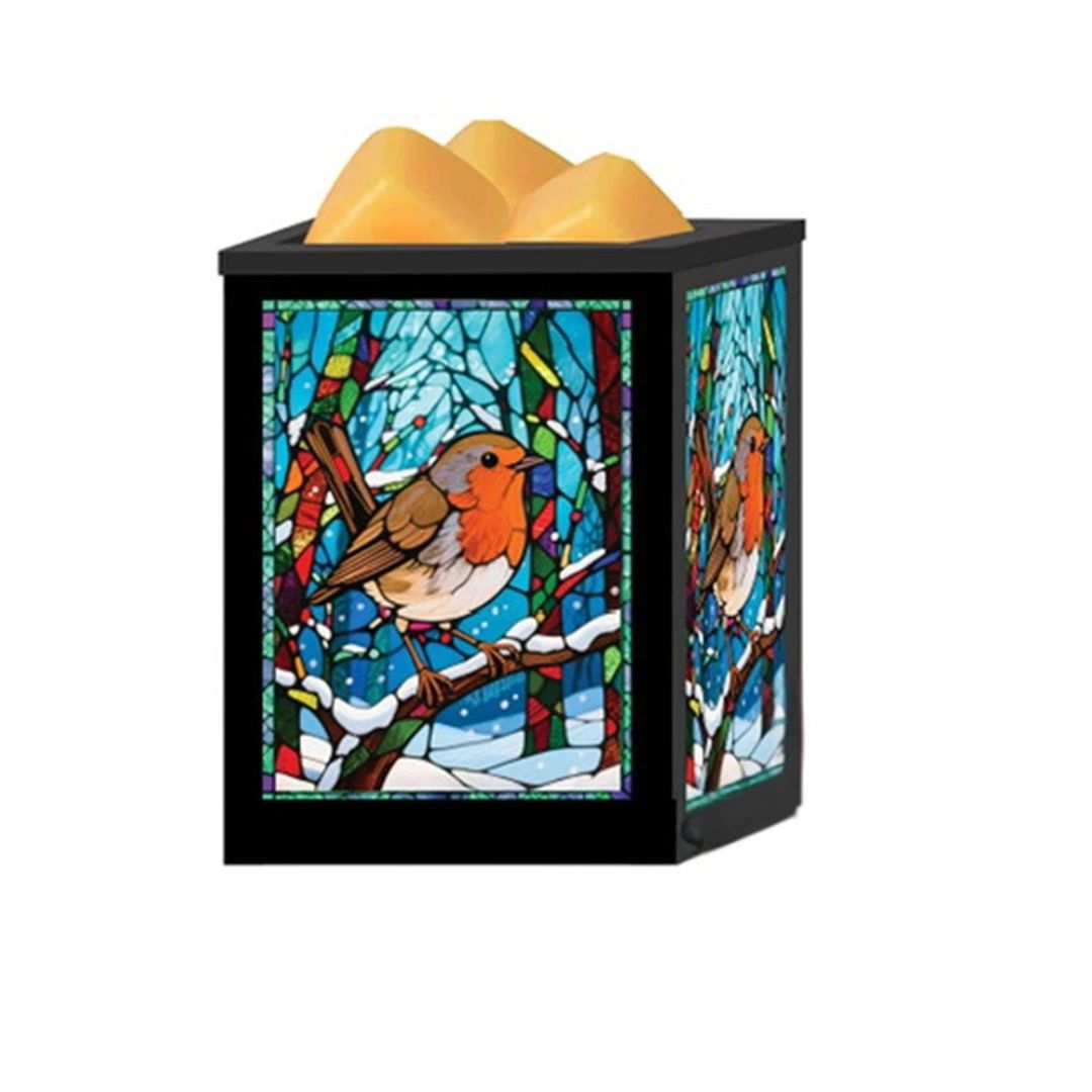 A square black decorative wax melt warmer featuring stained-glass-style winter bird artwork with robins in a snowy forest. The top has three yellow wax melts, and the front and side panels show colorful bird-and-forest imagery.