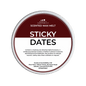 Scented wax melt container labeled 'Sticky Dates' with branding on a green background