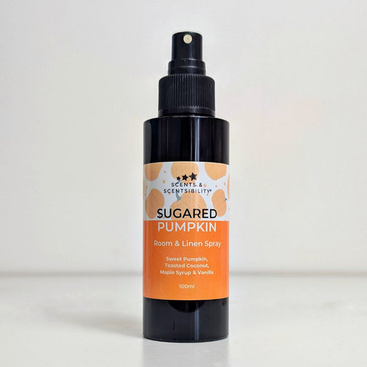Sugared Pumpkin room and linen spray bottle with orange label on a white background