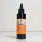 Sugared Pumpkin room and linen spray bottle with orange label on a white background