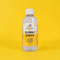 Bottle of 'Sunny Days' cleaner on a yellow background