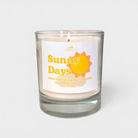 Scented candle labeled 'Sunny Days' with a sun design on a white background