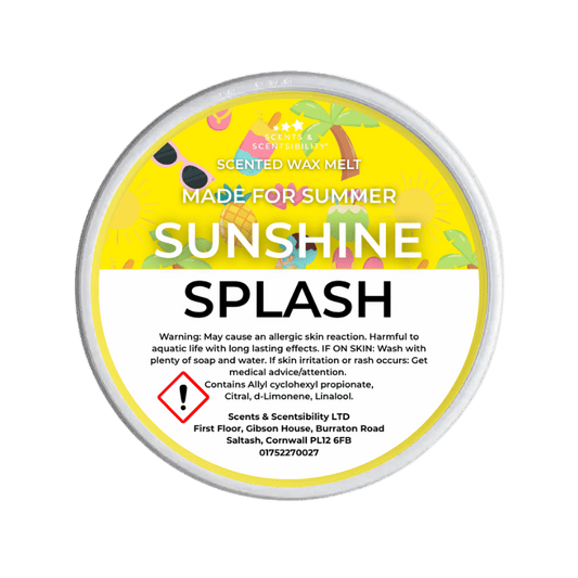 A round tub of Scents & Scentsibility LTD 'Sunshine Splash' scented wax melt, featuring a bright yellow and white label with summer-themed illustrations, set against a solid dark green background.
