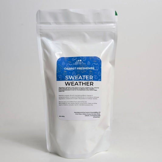 Carpet freshener package labeled 'Sweater Weather' on a white background