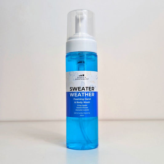 Foaming hand and body wash bottle labeled 'Sweater Weather' on a white background