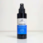 Room and linen spray bottle labeled 'Sweater Weather' on a white background