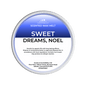 Scented wax melt container labeled 'Sweet Dreams, Noel' on a green background