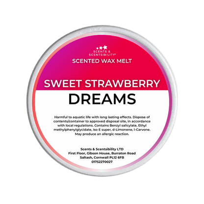 Scented wax melt container labeled 'Sweet Strawberry Dreams' on a green background