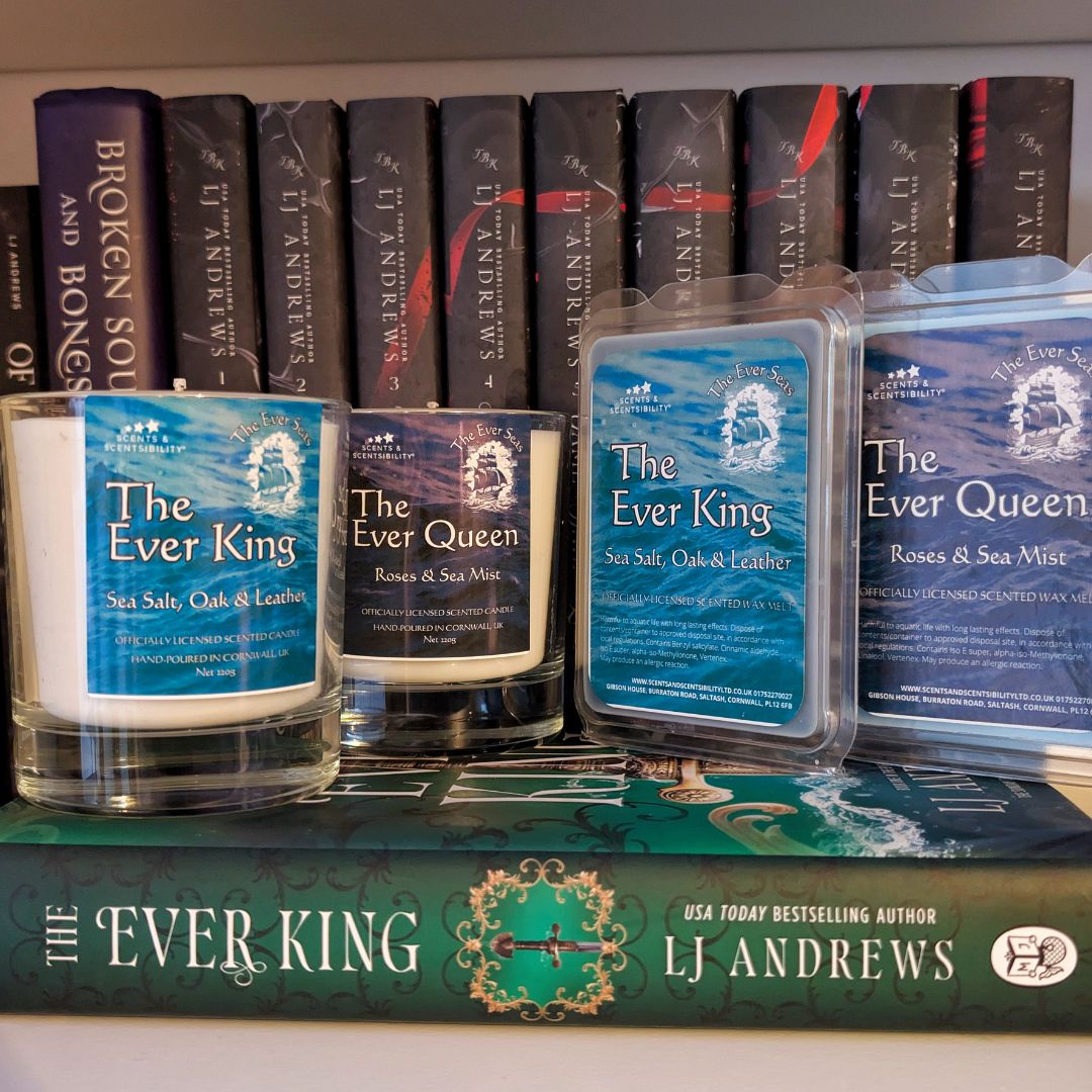 Candles labeled 'The Ever King' and 'The Ever Queen' on books with L.J. Andrews' name.