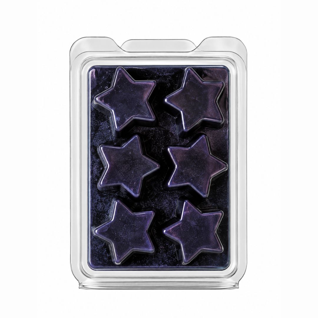 A clear plastic clamshell package containing six star-shaped wax melts in a deep purple color, set against a plain white background.