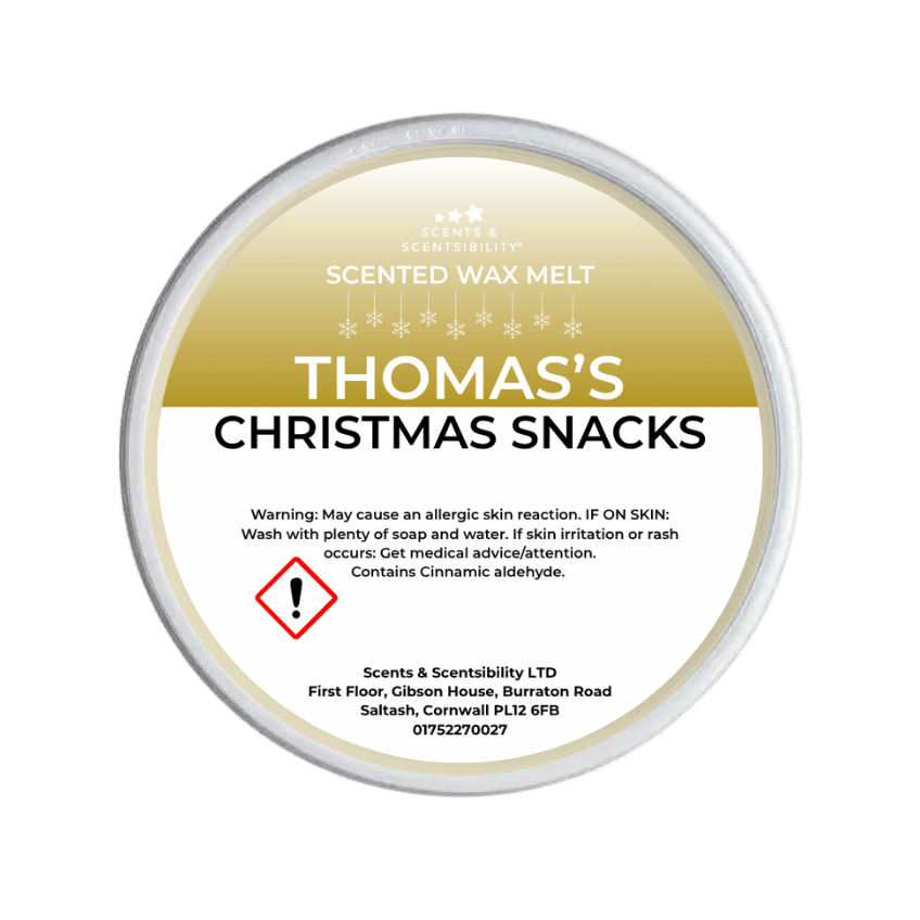 Scented wax melt container labeled 'Thomas's Christmas Snacks' on a green background