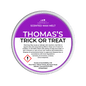 Scented wax melt container labeled 'Thomas's Trick or Treat' on a green background