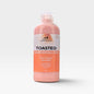 A 1000ml bottle of Scents and Scentsibility Toasted Marshmallow Face & Body Smoothie, featuring a peach-colored liquid and a white and orange label, set against a light gray background.